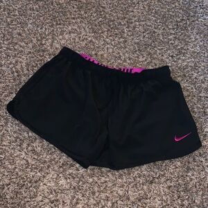 Nike black & pink shorts, size M.